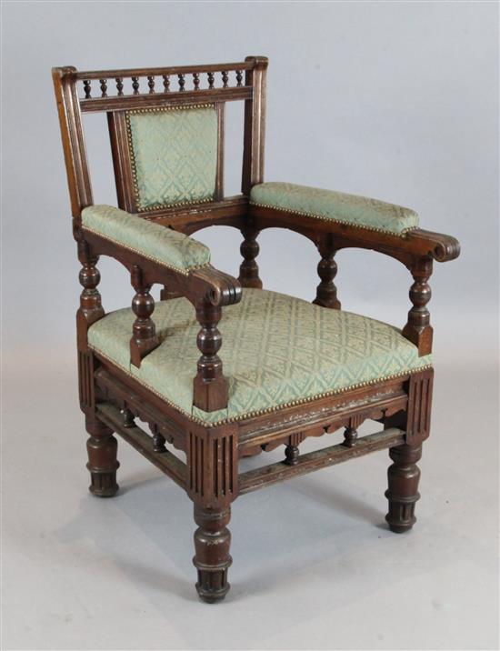 Bruce Talbot. A Victorian aesthetic movement oak armchair,